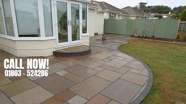 A patio at the back of a house